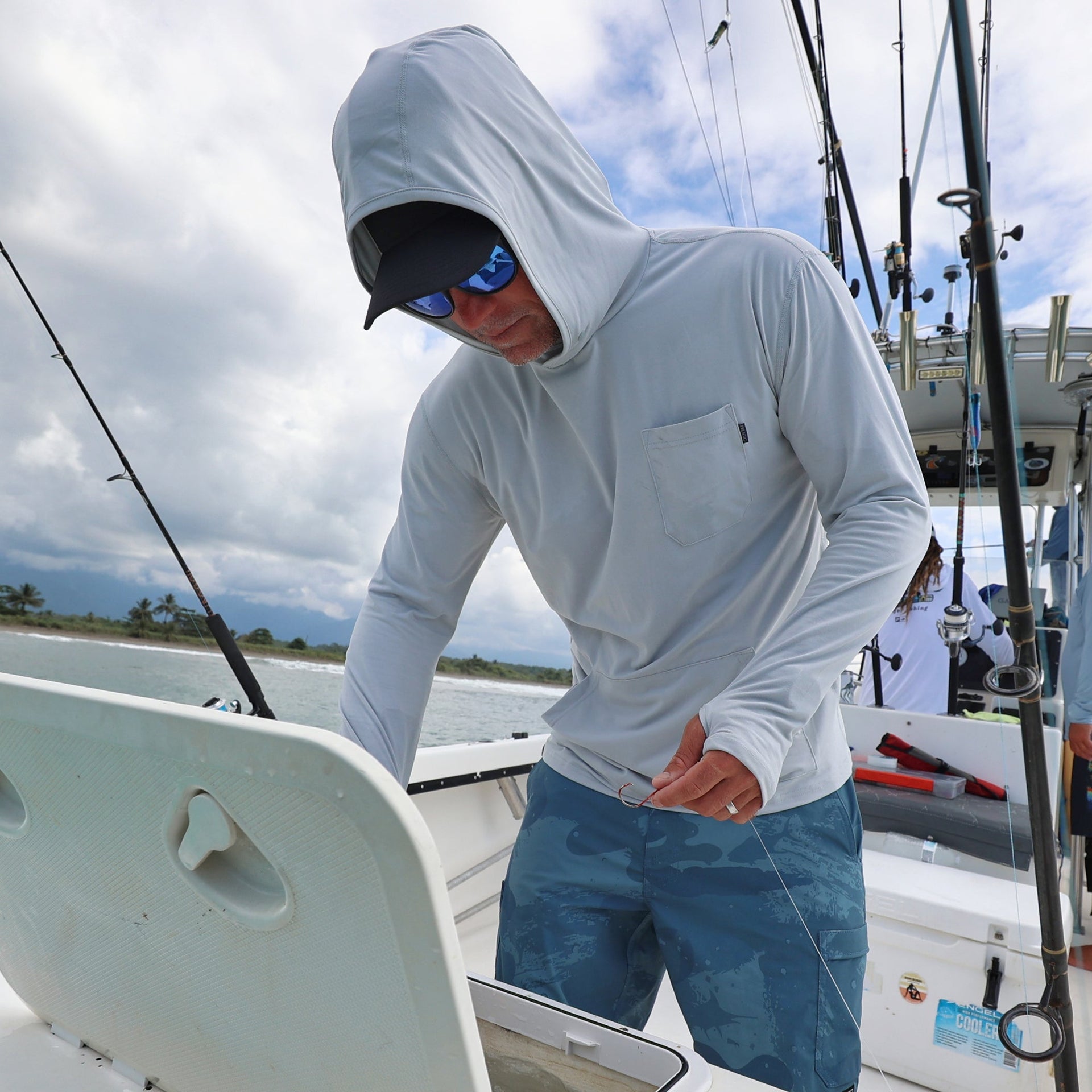 Pelagic Freespool Hooded Performance Shirt collection cover